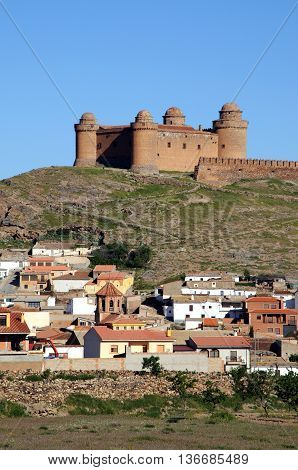 View of the castle and town buildings, La Calahorra, Andalusia, Spain.