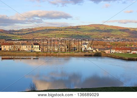 Town of Caerphilly by the castle lake