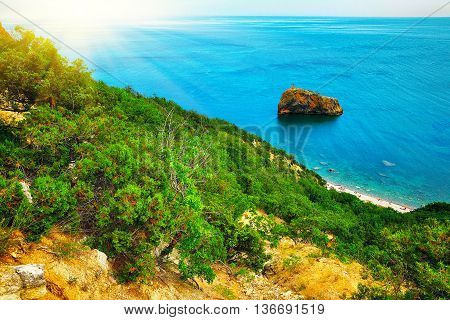 The coast at the cape Fiolent. The top view on the sea and rocks of the cape Fiolent. Crimea