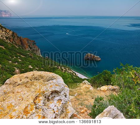 The coast at the cape Fiolent. The top view on the sea and rocks of the cape Fiolent. Crimea