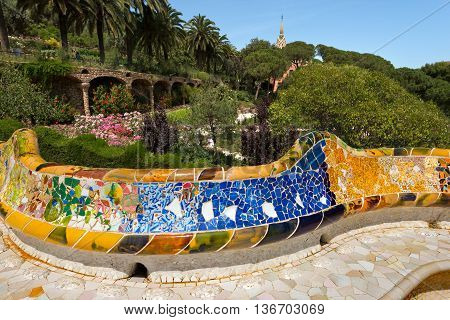 BARCELONA SPAIN - JUNE 10 2014: Ceramic bench in the Park Guell designed by the famous architect Antoni Gaudi (1852-1926). UNESCO World Heritage Site