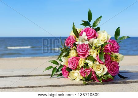 wedding bouquet the bride on background of the sea