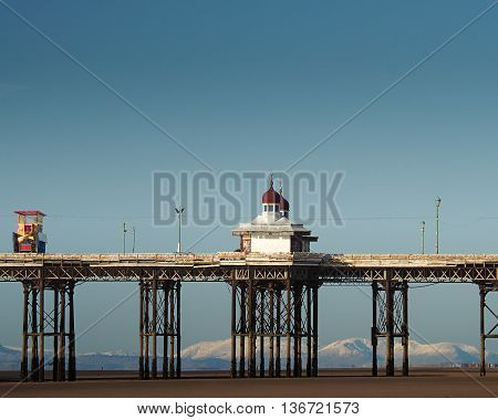 North pier at Blackpool UK with Cumbrian mountains