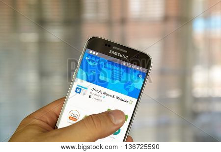 MONTREAL CANADA - JUNE 23 2016 : Google Play Newsstand on Android phone. Google Play Newsstand is a news aggregator and digital newsstand application developed by Google