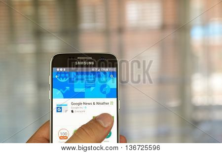 MONTREAL CANADA - JUNE 23 2016 : Google Play Newsstand on Android phone. Google Play Newsstand is a news aggregator and digital newsstand application developed by Google