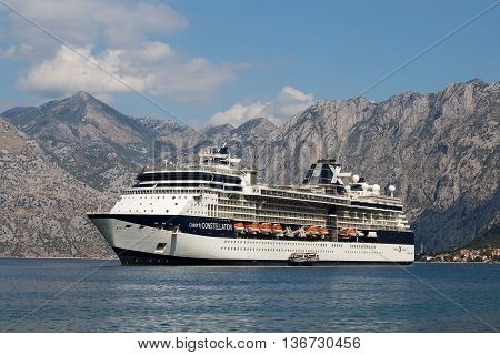 KOTOR MONTENEGRO - SEPTEMBER 23 2015 : Large cruise ship Celebrity Constellation in Boka Kotorsky Bay. Kotor has one of the best preserved medieval old towns in the Adriatic