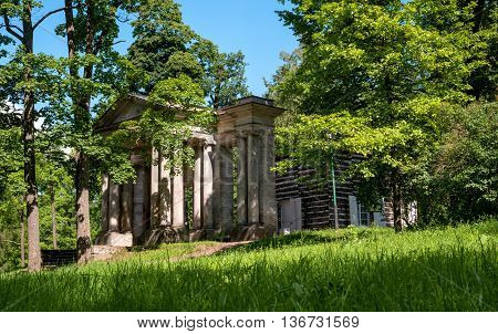Russia. Gatchina Palace Park. Birch House. In front is a portal mask. Built in the 18th century