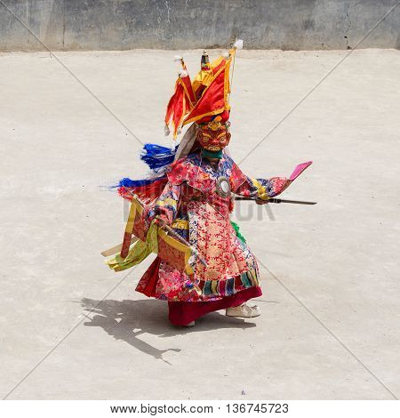 LAMAYURU INDIA - JUNE 13 2015: Unidentified buddhist lamas dressed in mystical mask dancing Tsam mystery dance in time of Yuru Kabgyat Buddhist festival at Lamayuru Gompa Ladakh North India