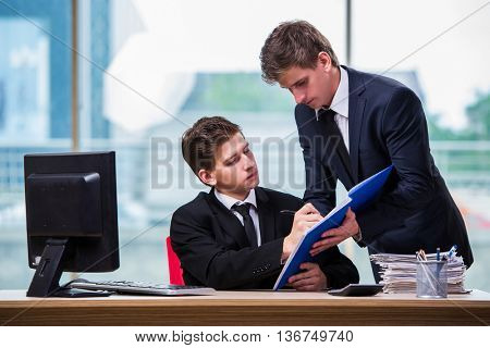 Two twin brothers discussing business project