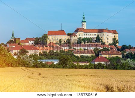 Mikulov Castle is Situated in The Town of Mikulov in South Moravia Czech Republic. Mikulov Castle Summer Scenery with Rye Field.