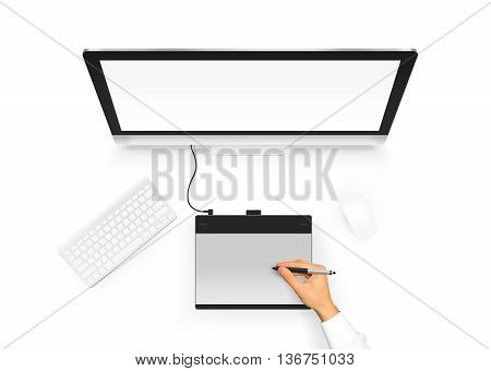 Designer drawing on graphic tablet near pc monitor blank screen. Artist design project with digitizer, stylus, computer, mouse and keyboard. Empty display monoblock from above. Creative workplace top
