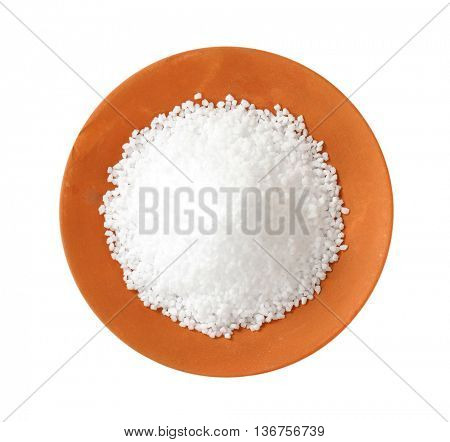 Coarse grained salt in terracotta bowl