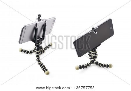 Smartphone set up on a tripod isolated over the white background, set of two different foreshortenings