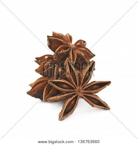 Pile of multiple Chinese star anise seeds, composition isolated over the white background