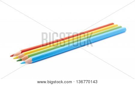 Four colorful drawing pencils composition isolated over the white background