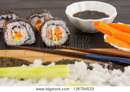 Preparing Sushi. Sushi Rolls And Chopsticks