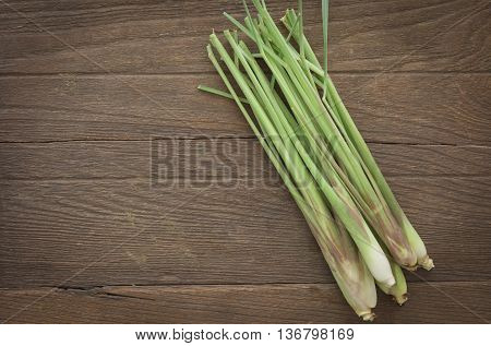 Top view Fresh lemon grass on wood table.