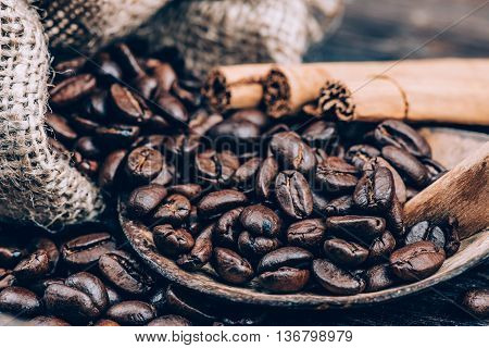 Fine roasted coffee beans concept, coffee beans in a bag