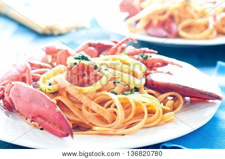 delicious cooked Italian pasta with a sauce of lobster