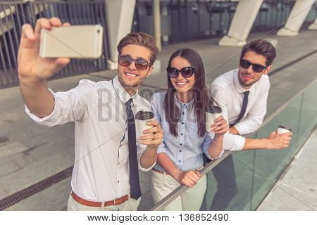 Business People With Gadget