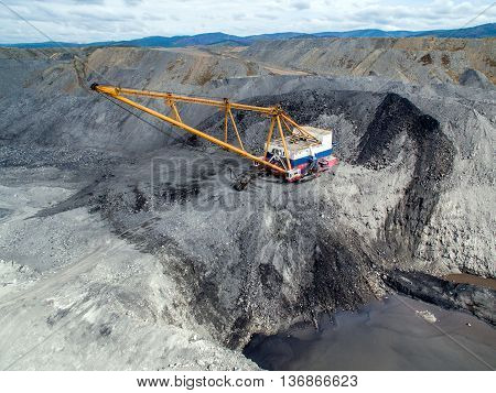 Dragline on open pit coal mine in Russia