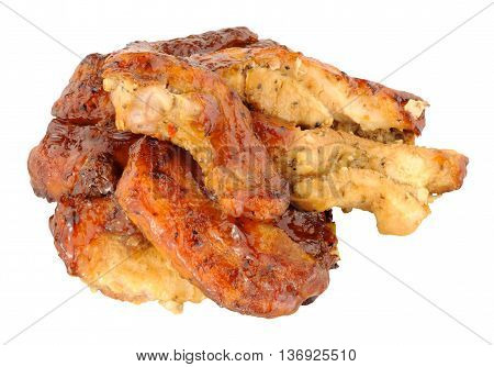 Slow cooked pork belly slices isolated on a white background