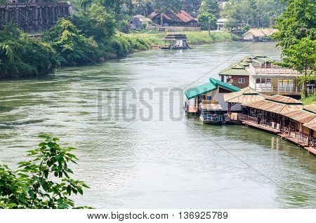 Beautiful landscape Kwai Noi river under Death Railway bridge and floating resort at Krasae cave in Kanchanaburi province Thailand