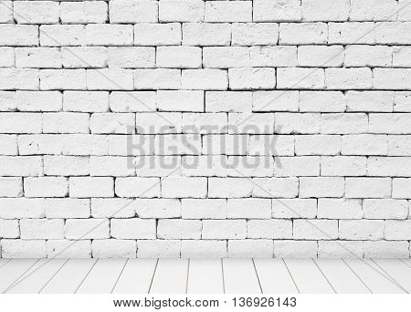 White stone blick wall and wood floor background.