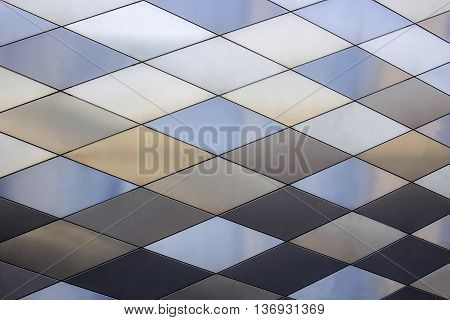 Abstract architectural pattern. Metal texture background. Colored metal plates.