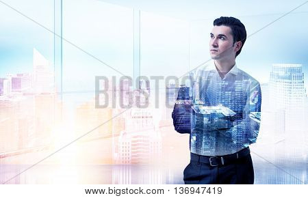 Caucasian businessman with folded arms on New York city background with sunlight. Double exposure