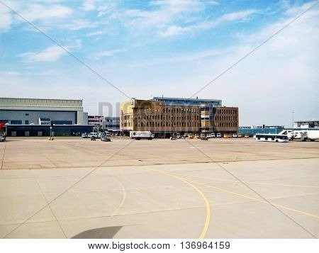 Stuttgart Germany - May 26 2008: Terminal labeled with Stuttfart at Airport Echterdingen - view from inside of airplane runway in front