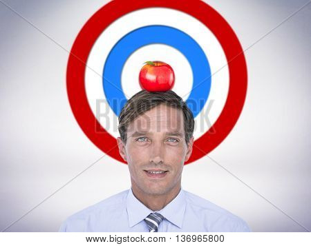 Portrait of handsome businessman against grey background