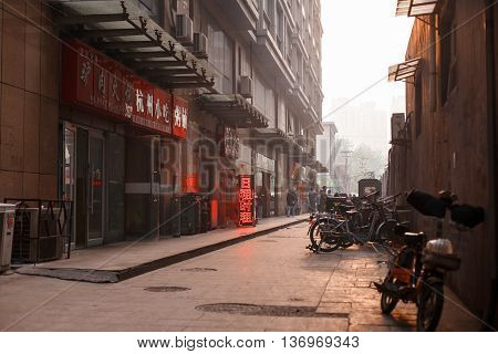 TIANJIN CHINA - APRIL 13: Chinese street at sunset background