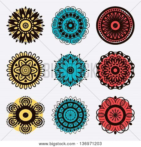 Set of nine mandalas in blue, yellow, red colours.