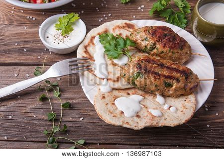 Kofta With Flatbread On Plate With Salad