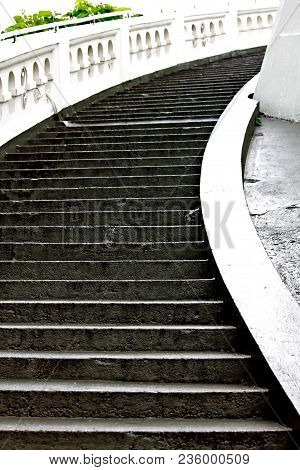 Concrete Stairs Are Designed To Bend Up High.