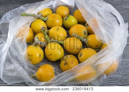 Mature Japanese Medlar, Spring Fruity, Japanese Medlar Japanese Medlar On Wooden Floor