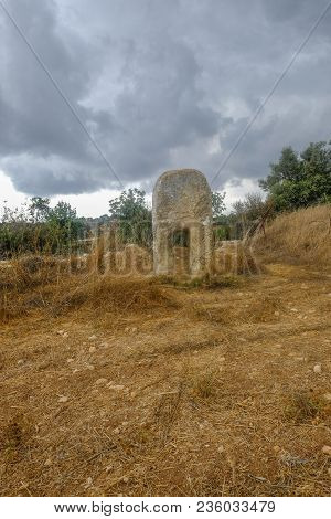 Pachna, Limassol, Cyprus - October 6, 2017:  Acient Standing Stone At The Edge Of A Field In The Cou