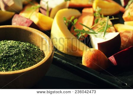Pan Full Of Fall Seasonal Vegetables Ready To Be Grilled Over A Dark Background .