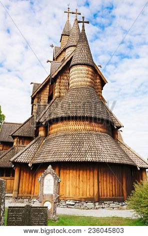 Heddal, Norway-august 15, 2014 -  Old Stave Church And Cemetery In Norwegian Village.