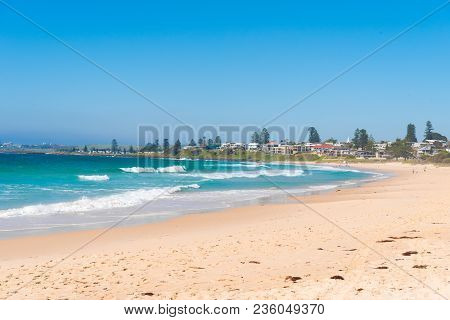 People Enjoying The Sunny Weather On The Beach At Shellharbour, Nsw, Australia