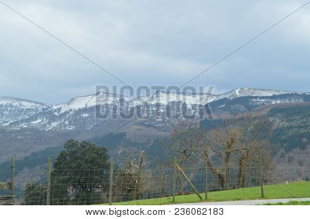 Snowy Mountains Of The Gorbeia National Park Views From Urigoiti. Nature Mountains Landscapes. March