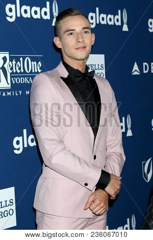 LOS ANGELES - APR 12:  Adam Rippon at GLAAD Media Awards Los Angeles at Beverly Hilton Hotel on April 12, 2018 in Beverly Hills, CA