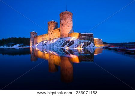Olavinlinna Fortress In The Evening Of March. Savonlinna, Finland