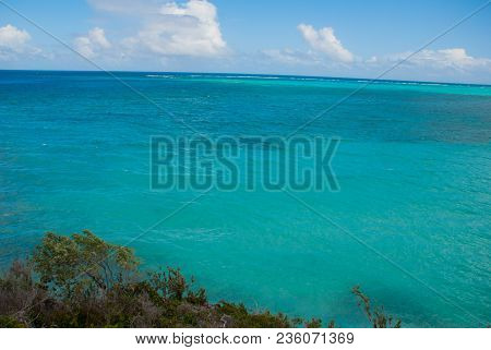 Holguin, Cuba: Beautiful Landscape With The Caribbean Sea Turquoise And Blue Sky With Clouds.