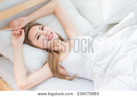 Woman Wake Up On Bed In The Morning