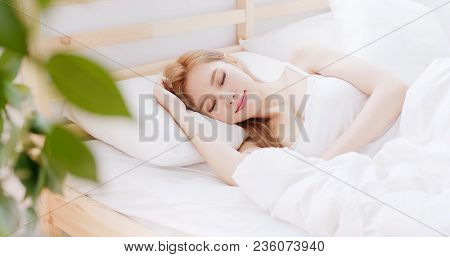 Woman Sleep On The Bed At Home In Morning