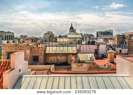 Aerial View Over The Rooftops Of The Eixample District In Barcelona, Catalonia, Spain