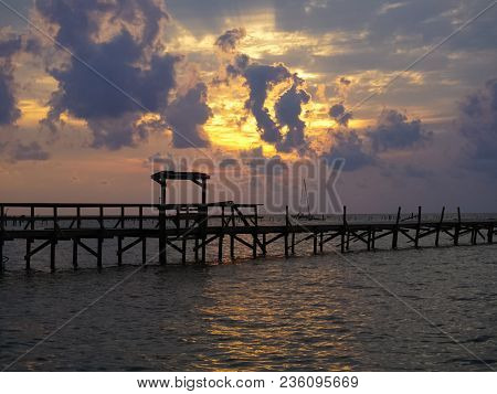 A Sunrise Over The Bay With Pier Destruction In Rockport Texas After Hurricane Harvey