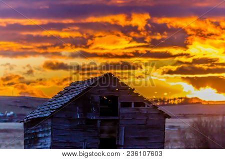 Stunning Sunrise Over A Rustic Out Building, Springbank, Alberta, Canada